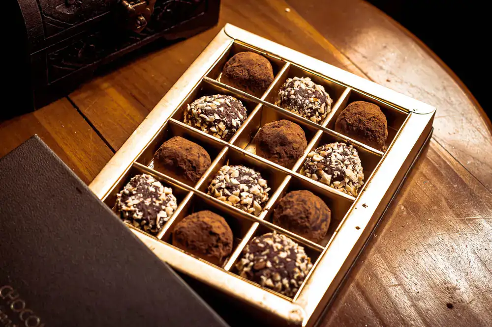Small elegant box of dark chocolate truffles