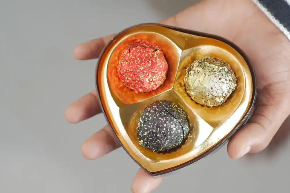 Hand-painted chocolates in a cream gift box